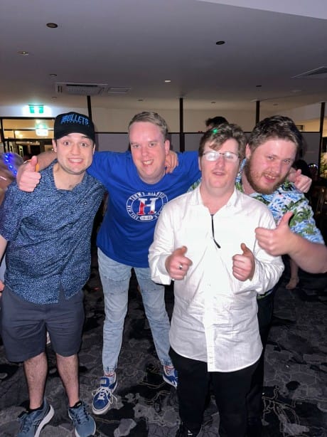 Group of men smiling for a picture
